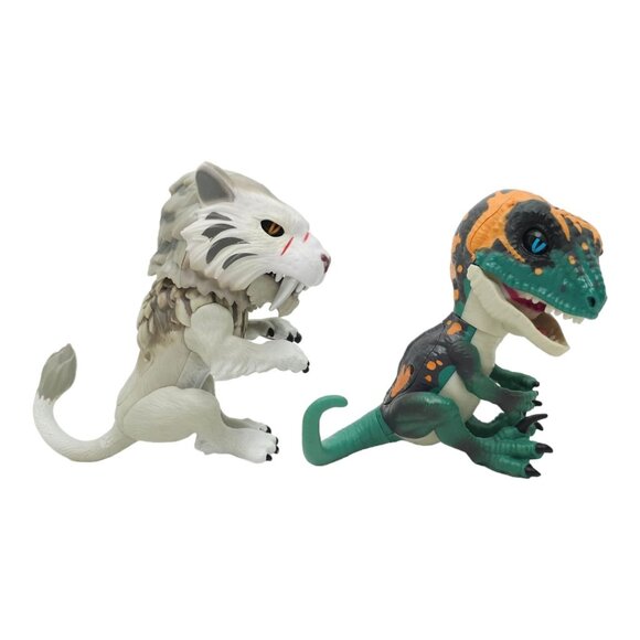 WowWee Fingerling Untamed Raptor Fury Velociraptor Silvertooth Sabre Tooth Tiger - Picture 2 of 12